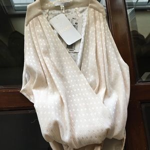 New sleeveless bodysuit.